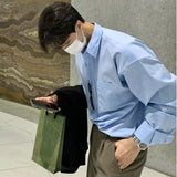 Yeknu Korean Fashion Men High-end Light Blue Shirt Men Summer Solid Color Simple Casual Loose Button Pocket Long sleeve Shirts for Men