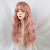 Yeknu Synthetic Long Wavy Curly Pink Wig with Bangs Lolita Cosplay Women Fluffy Hair Heat Resistant Wig for Daily Party