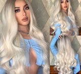 Yeknu Long Natural Wavy Platinum Blonde Wigs with Bangs Cosplay Party Lolita Synthetic Wigs for Women Heat Resistant Fiber